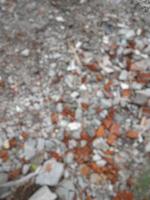 Defocused abstract blur of demolition material for houses consisting of brick and mortar photo