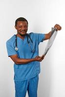 Black surgeon doctor bearded man in blue coat with crossed arms isolated white background copy space photo