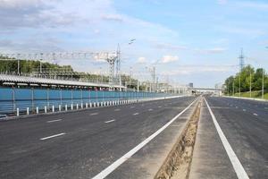 New traffic intersection road construction site. Development of Transport infrastructure junction, improvement highway. Overpopulation problem. Erection overpass of northeast chord in Moscow, Russia photo