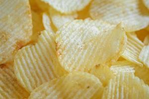 crispy potato chips snack texture background photo