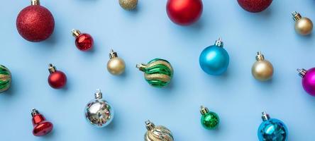 Christmas ball bauble pattern minimal flatlay on blue pastel background top view photo