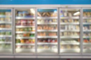 supermercado refrigeradores comerciales congelador que muestra alimentos congelados resumen fondo borroso