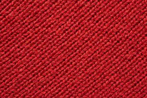 Red knitted cloth wool texture surface background photo