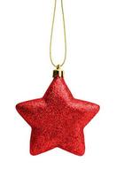 Red Christmas star ornament bauble isolated on white background photo