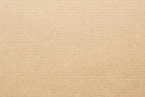 Brown eco recycled cardboard paper sheet texture background photo