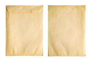 Old vintage paper sheet envelope texture isolated on white background photo