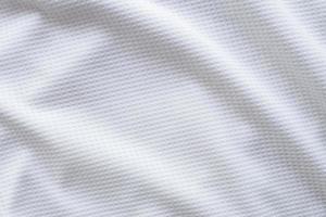 Ropa deportiva blanca tela camiseta de fútbol jersey textura resumen antecedentes foto