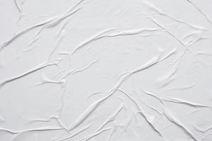 Blank white crumpled and creased paper poster texture background photo