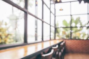 Cafe coffee shop interior abstract blur defocused with bokeh light background photo