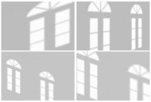 Window shadow drop on white wall background photo