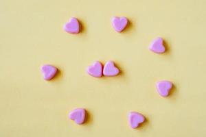 Valentines day background with heart shape candy photo