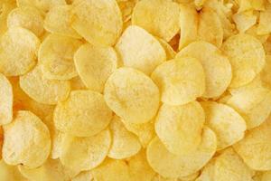 patatas fritas crujientes snack textura fondo vista superior foto
