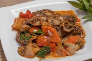Anadara granosa stir-fried chili paste. Spicy Thai food. photo