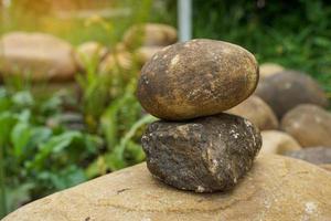 Stone Balance is an art that arises from stacking rocks together. Soft and selective focus. photo