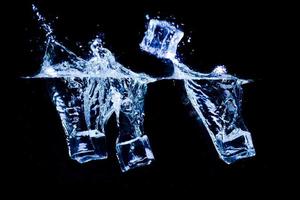 ice cubes on a black background photo