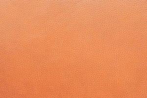 background image abstract pattern of orange leather photo