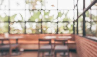 Cafe coffee shop interior abstract blur defocused with bokeh light background photo