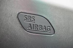 Safety side curtain airbag sign in new modern car photo