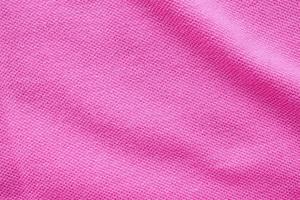 Pink cotton fabric texture closeup background photo