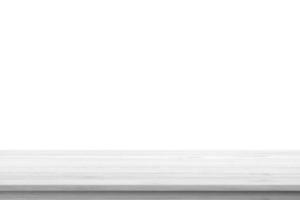 Empty white wooden table top isolated on white background photo