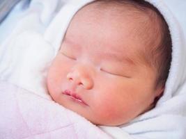 Cute newborn asian baby girl photo