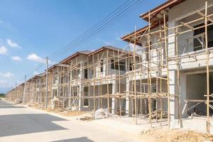 construction residential new house in progress at building site housing estate development photo