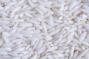 Thailand white glutinous sticky rice texture background photo
