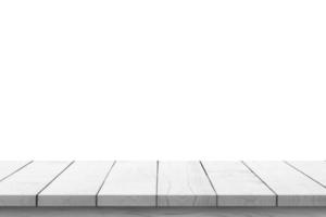 Empty white wooden table top isolated on white background photo