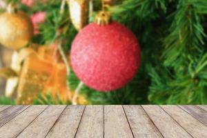 Christmas holiday background with empty rustic wood table photo