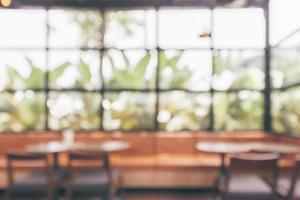 Cafe coffee shop interior abstract blur defocused with bokeh light background photo