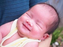 Cute asian Newborn baby girl photo