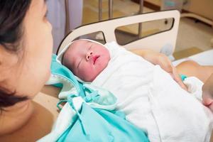 Happy Mother and Newborn Baby at the hospital photo