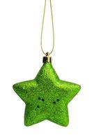 Green Christmas star ornament bauble isolated on white background photo