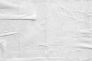 white crumpled and creased paper poster texture background photo