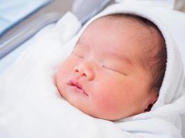 Cute newborn asian baby girl photo