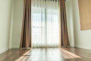 Curtain window interior decoration in living room on sunny day with sunlight photo