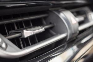 Air conditioner in modern car close up photo