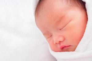 Cute newborn asian baby girl photo