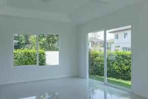 Empty room with glass window frame house interior on concrete wall photo