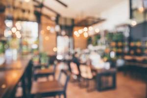 Restaurant cafe or coffee shop interior with customer blur abstract vintage style bokeh light for montage product display background photo
