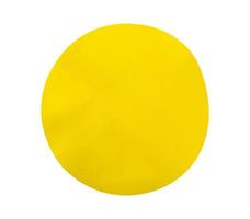 Yellow round plastic sticker label isolated on white background photo
