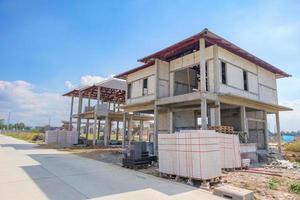 construction residential new house in progress at building site housing estate development photo