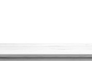 Empty white wooden table top isolated on white background photo