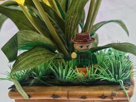 October 2022, Jakarta Indonesia, Minifigure of a farmer in a brown hat in the Miniature forest photo