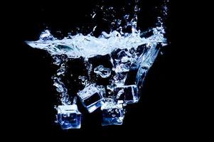 ice cubes on a black background photo