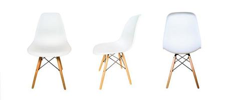 White modern chairs with wooden legs. photo
