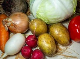 Still life of vegetables. Healthy food. Harvest from the garden.  Borsch set. Harvest root vegetables on the table photo