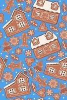 Gingerbread seamless pattern on a blue background. Vector graphics.