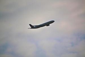 Manchester in the UK in October 2022. A Plane taking off from Manchester Airport photo