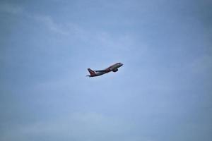 Manchester in the UK in October 2022. A Plane taking off from Manchester Airport photo